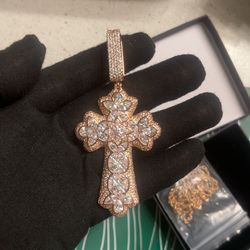 Iced out rose gold cross pendant