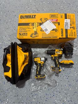 Dewalt 20 volt set with 1/4” impact driver, 1/2” drill, 1 -2AH battery, charger and bag NEW