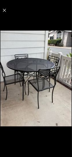 Metal table with chairs