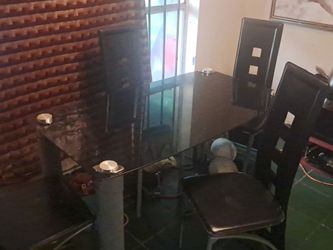 Glass table with 4 chairs