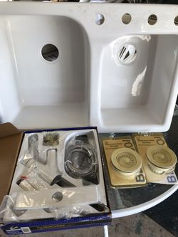 New Fiberglass sink, drains,and fancy spray faucet
