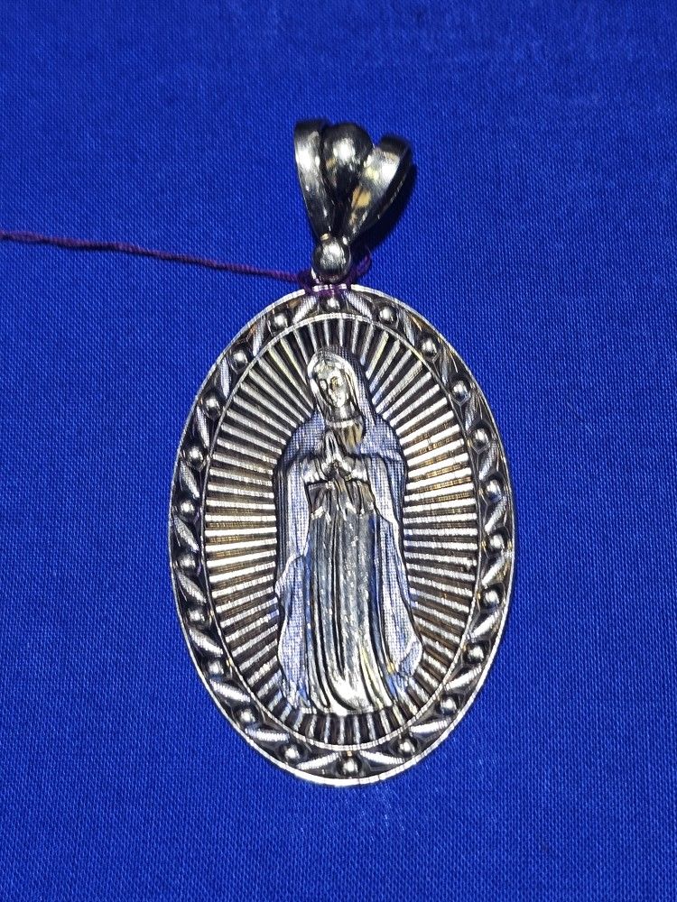 10kt YG Virgin Mary Pendant. (C-1) ASK FOR RYAN. #(contact info removed)88