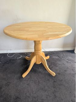 36” round wooden dining table