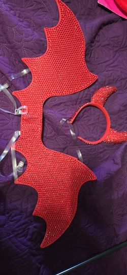 Devil Horns And Red Wings