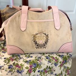 Juicy Couture velour weekender bag with pink trim and embroidered logo.