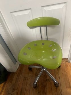 short green swivel chair