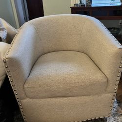 2 Swivel Barrel Chairs