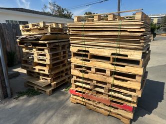 FREE PALLETS AND PLYWOOD MUST TAKE ALL