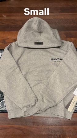 Dark oatmeal essentials hoodie size small but fits like a medium