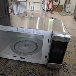 Microwave Frigidaire used stainless steel works
