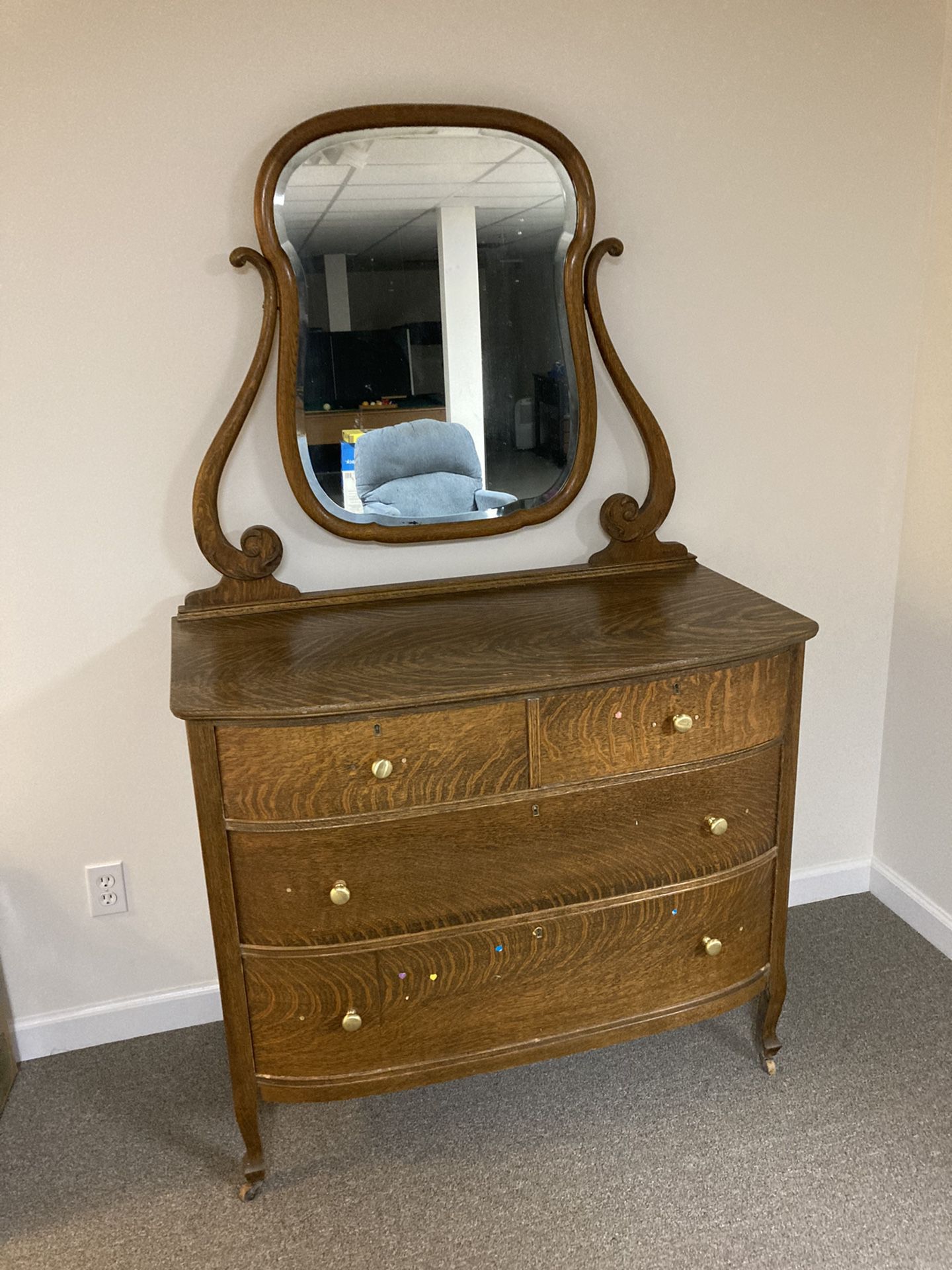 Antique dresser with mirror.