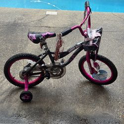 Bicycle w/training wheels  $40 obo