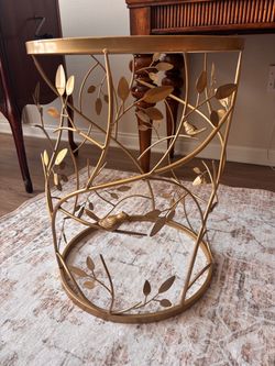 Delicate gold side table