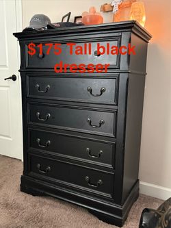 Tall black dresser