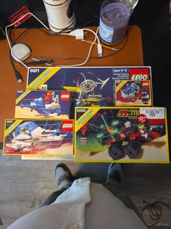 Lego space sets from the 80s and 90s.  NEW IN BOX