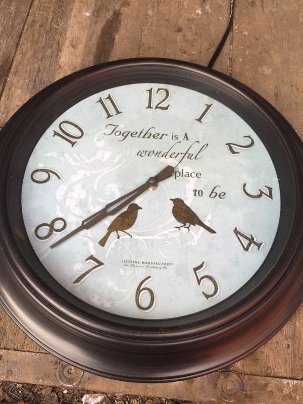 round white and black Analog clock