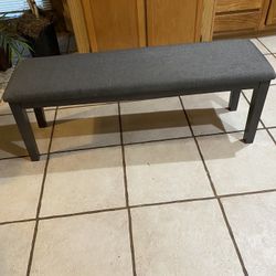 Gray upholstered bench. Read description for details and location.