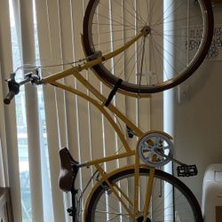 Yellow Retrospec Bike with Stand And Basket