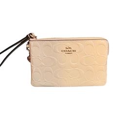 Coach Zip Wristlet Signature Debossed Patent Leather Cream Gold Heart Charm