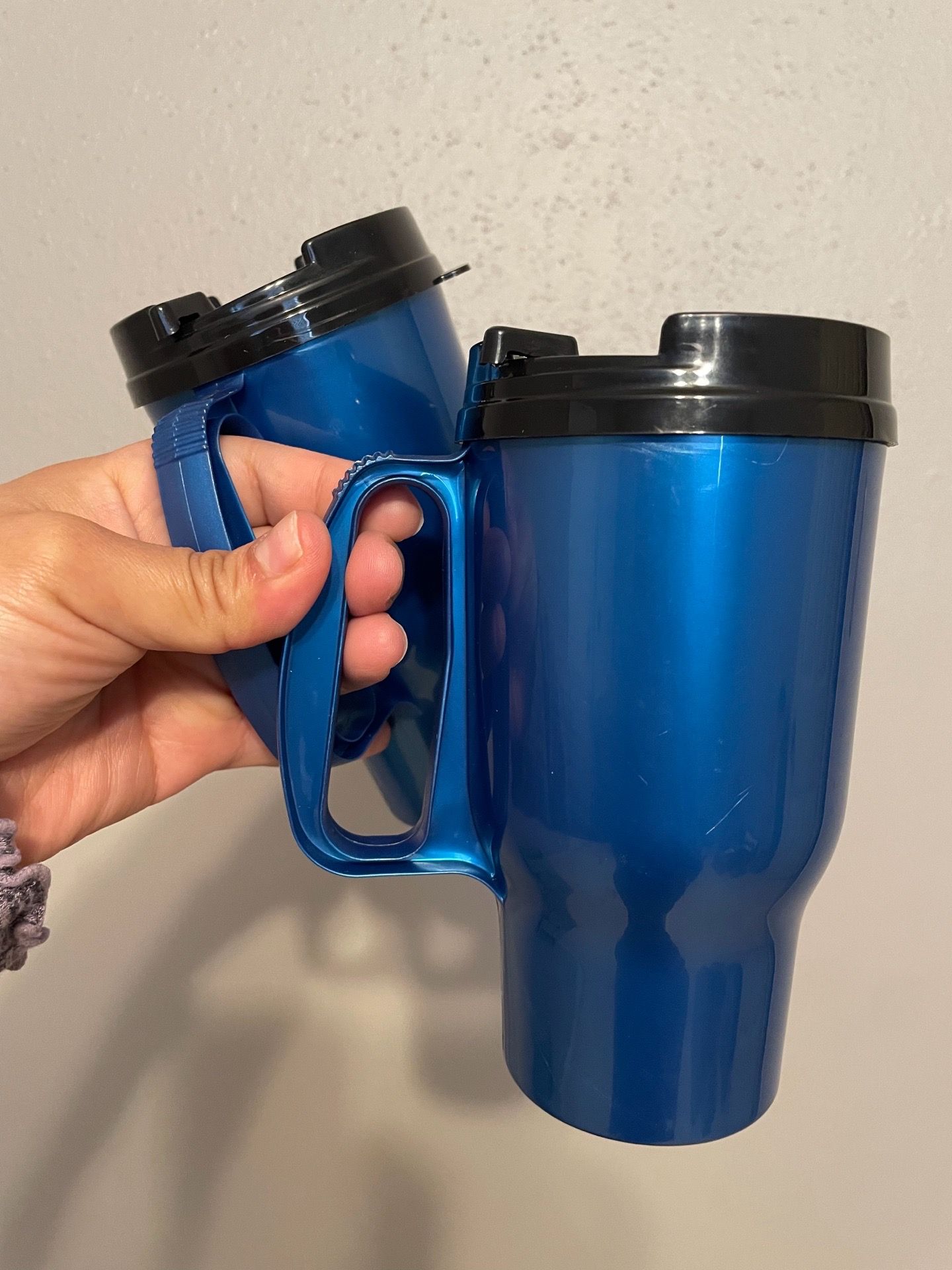 2 blue plastic thermos - 1$