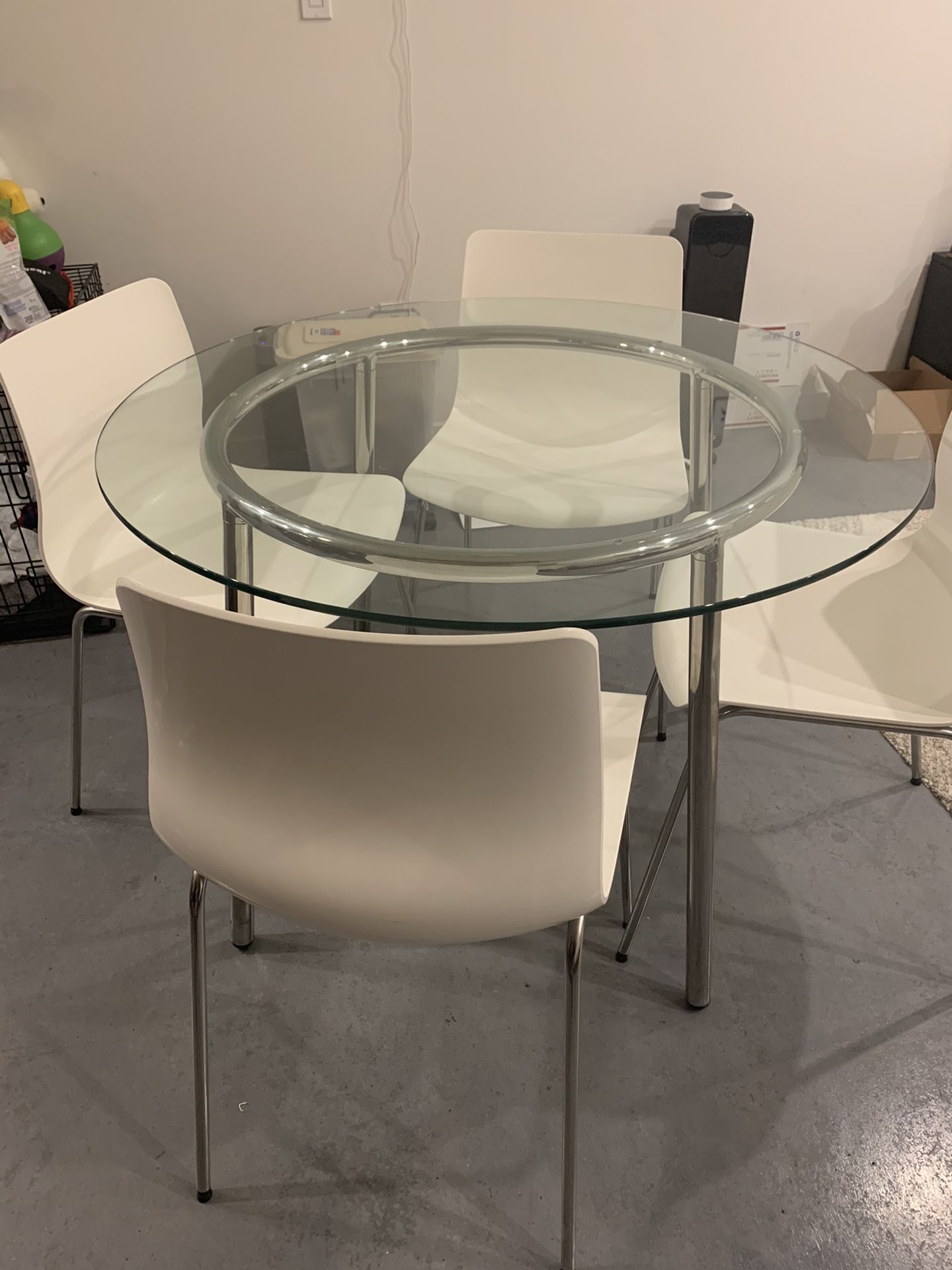 IKEA Salmi glass dining table set with 4 white dining chairs for Sale in Seattle, WA - OfferUp