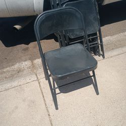 7 Black Folding Chairs