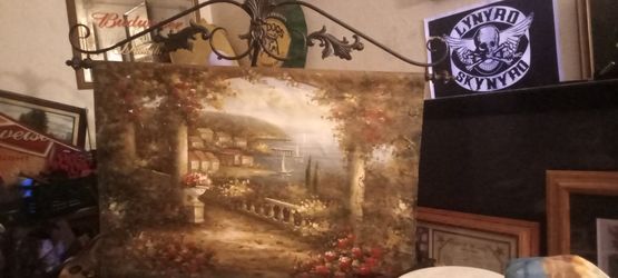 Canvas painting with rod iron hanger