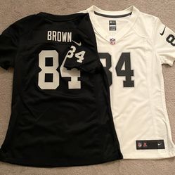2 Women Raider’s Jerseys Like New 