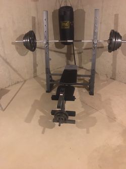 Olympic weight bench and 300lb set