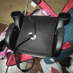 Brand new even flo booster seat with seat belt strap (MAKE ME AN OFFER IM NOT FIRM ON PRICE)