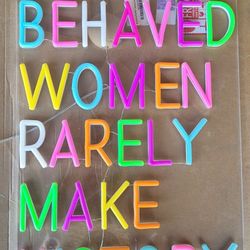 Neon sign "well behaved women rarely make history" **missing plug.  I do not have the plug for this to test. 
