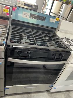 Whirlpool gas stove 4 burners in stainless steel