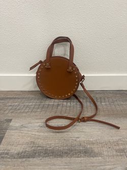Round faux leather purse