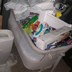 Baby Crib Filled With Baby Items