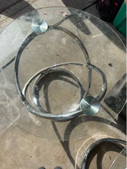 Glass and silver tables