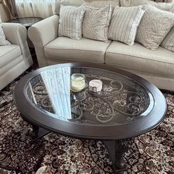 1 Oval coffee able with 2 round side table