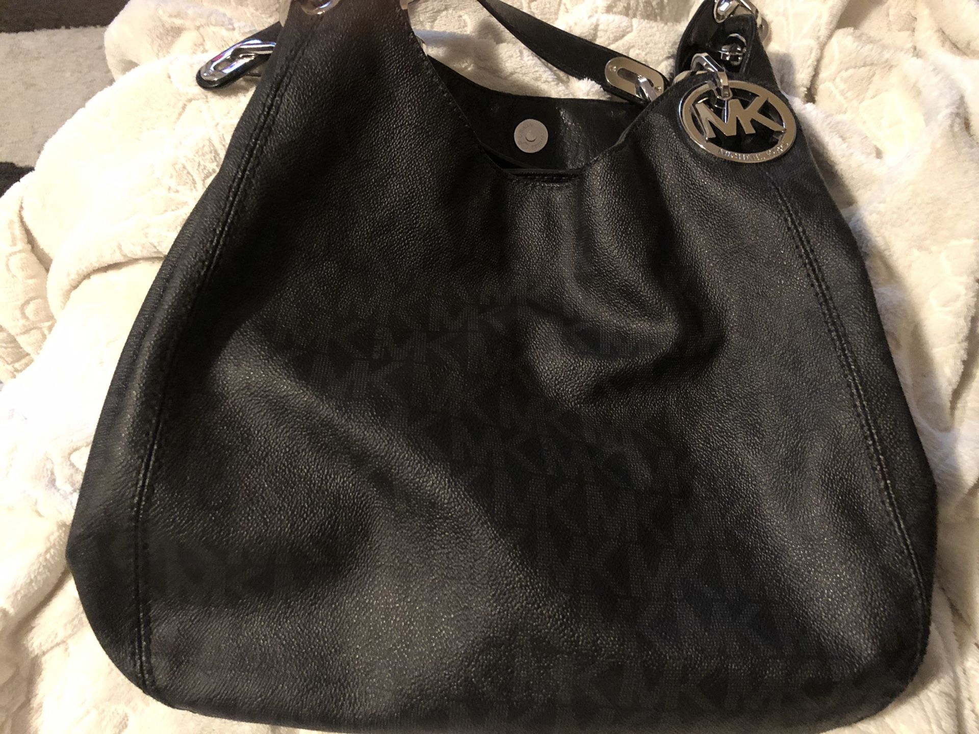 Michael Kors black leather hobo bag/ slightly used