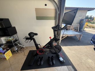Peloton bike and mat (shoes if wanted as well)