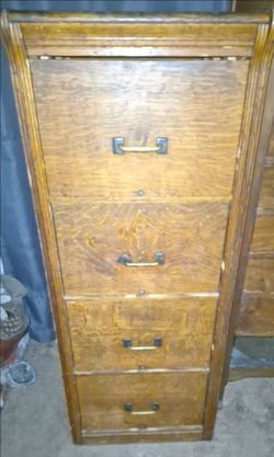 Vintage tiger oak wood file cabinet.4 drawers.