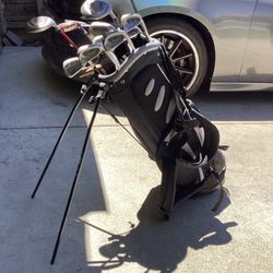 Spaulding Set Of Golf Club Driver Putter With Super Light Bag very good condition