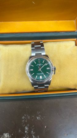Rolex green face