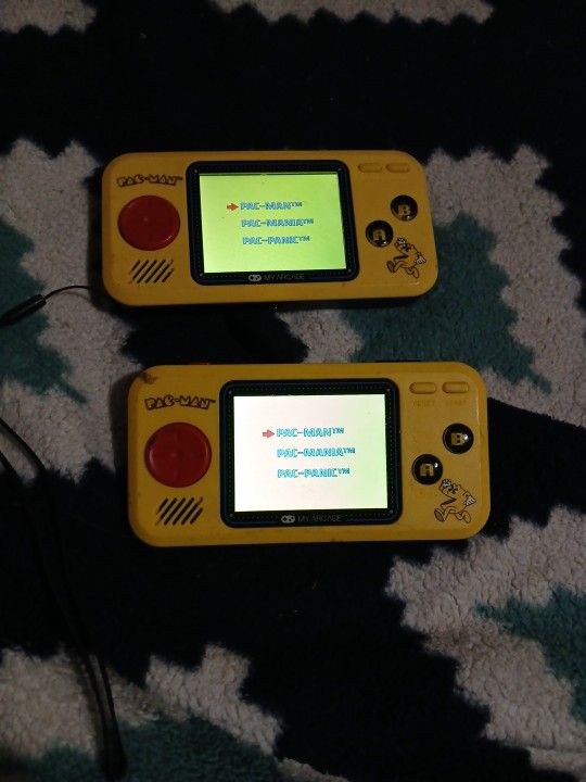 Pac man handheld arcade game , has three games inside