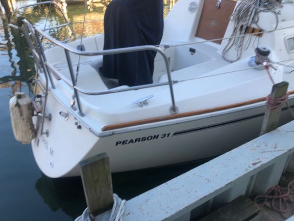 Pierson 31 1988 sloop draft 3’9 wing keel 2 cylinder yan marr diesel engine beam is 10 foot six a lo