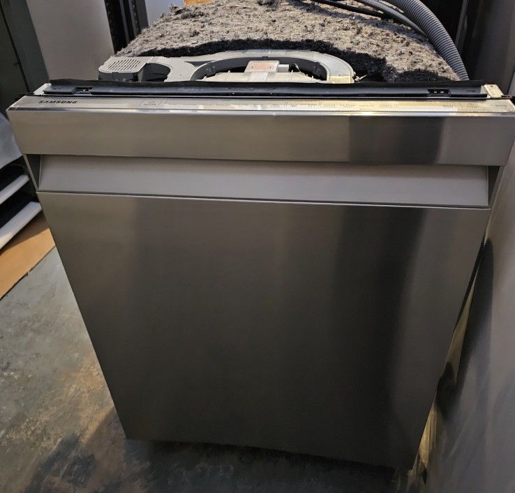 SAMSUNG STAINLESS STEEL DISHWASHER WITH INTERIOR STAINLESS STEEL TOO AND 3 RACKS.....$ 300