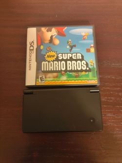 DSI + game super Mario Bros DS used