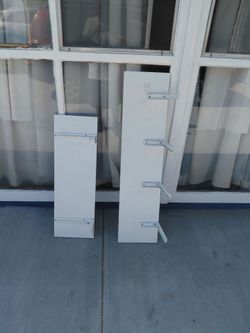 2 white wood shelves