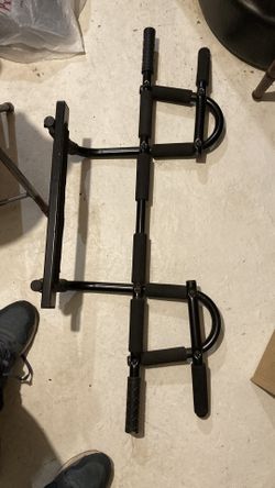 Chin up bar hangs on your door molding fits any frame with space in between the doors
