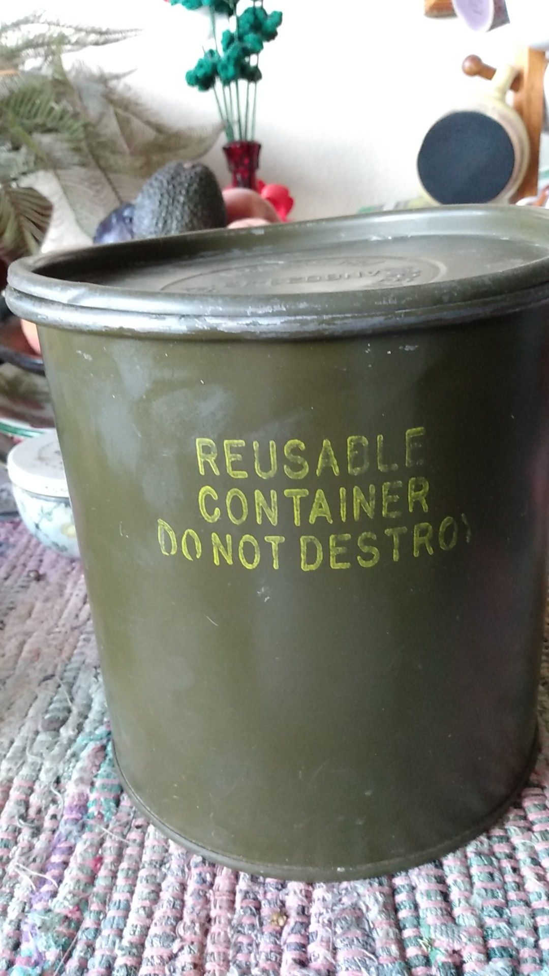 Vintage military container with camping supplies inside π
