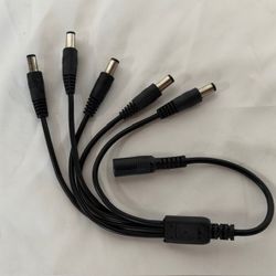  5-way DC power splitter cable, designed to allow a single power adapter to supply power to multiple devices simultaneously