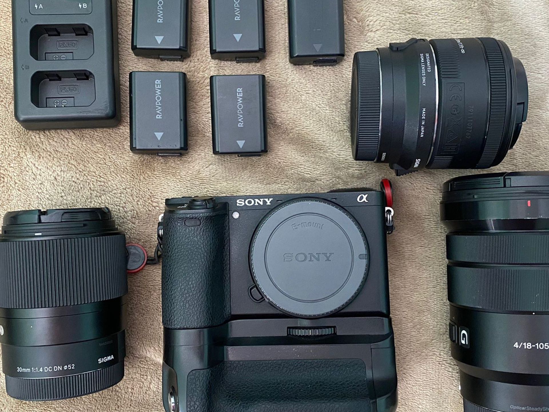 Sony A6500 With Sigma 30mm F1.4, Sony 18-105 F4, Sigma MC-11 E-EF Adapter, Canon 50mm 1.8 And Extra